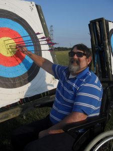 Man at Outdoor Archery session