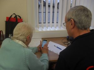 Jean learning to use her iPhone